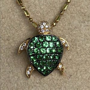 18kt Gold Turtle Pendant w/ green garnet and Dias.